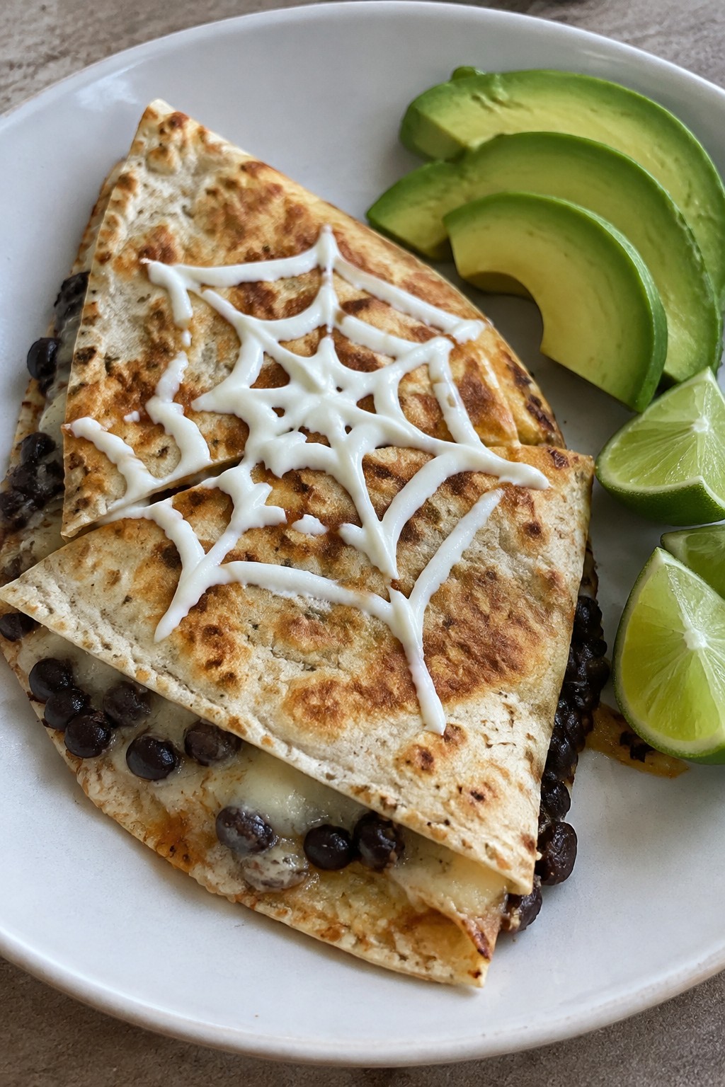 Spiderweb Black Bean Quesadillas with Avocado and Lime
