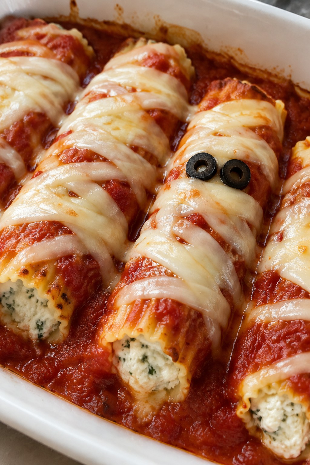 Mummy-Wrapped Manicotti in Marinara