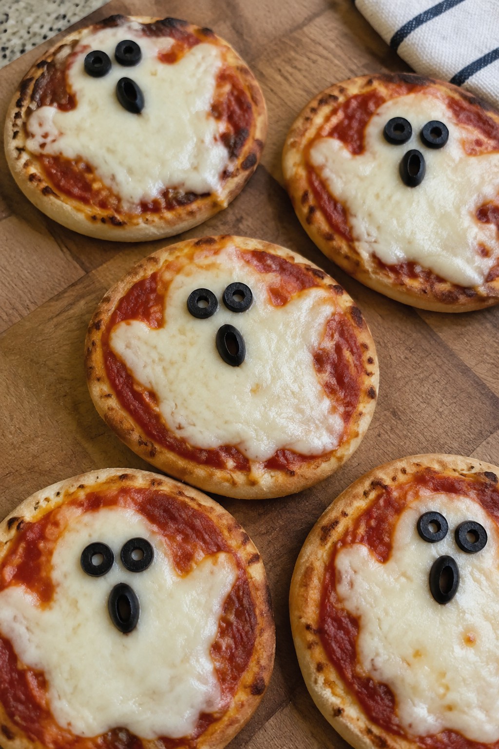 Spooky Ghost Mozzarella Pizzas
