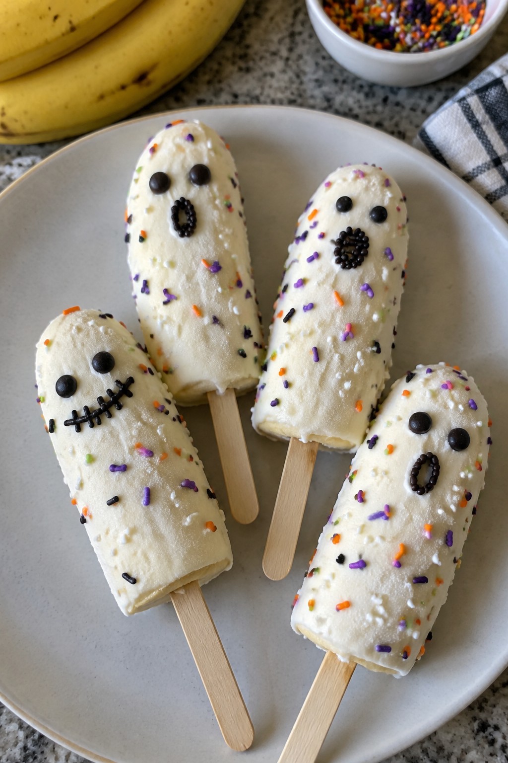 Ghost Banana Pops Dipped in Yogurt and Sprinkles