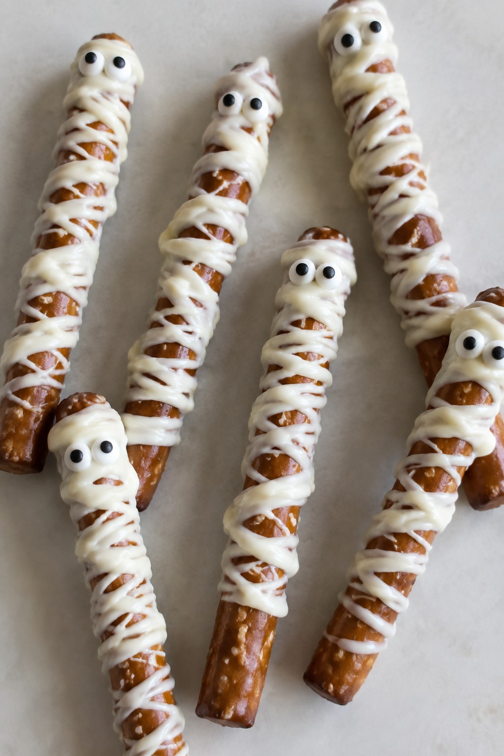 Mummy-Wrapped Pretzel Rods with White Chocolate