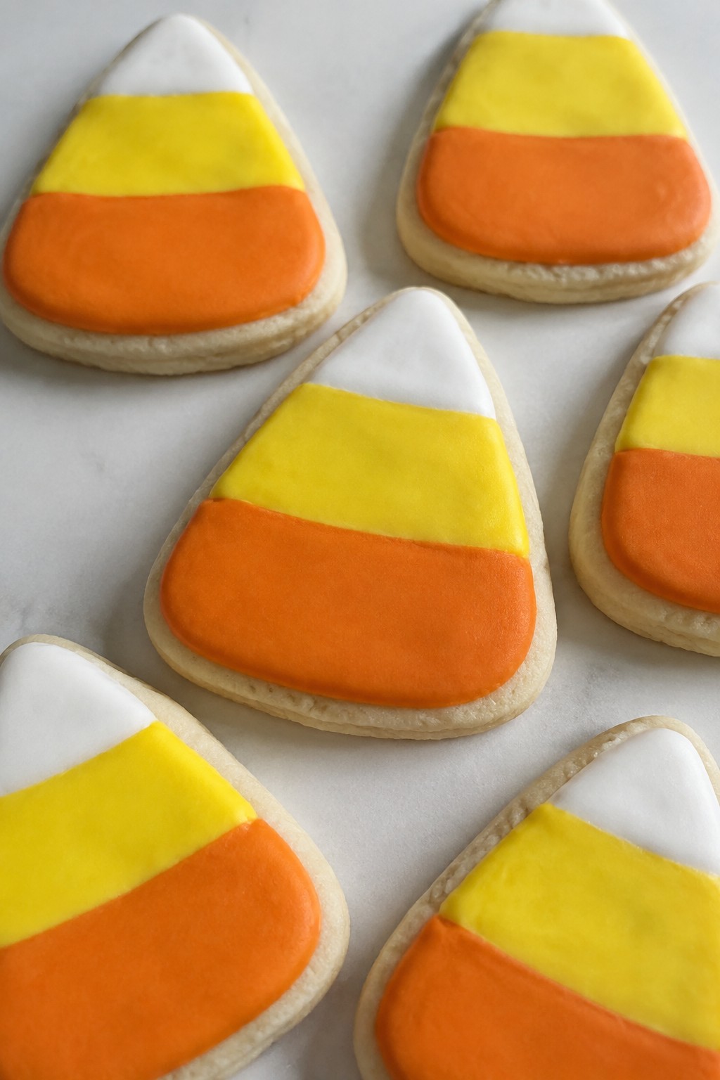 Candy Corn Sugar Cookies with Layered Tri-Color Icing