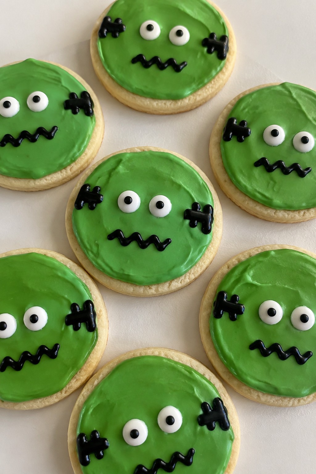 Frankenstein Sugar Cookies with Green Icing and Bolt Details