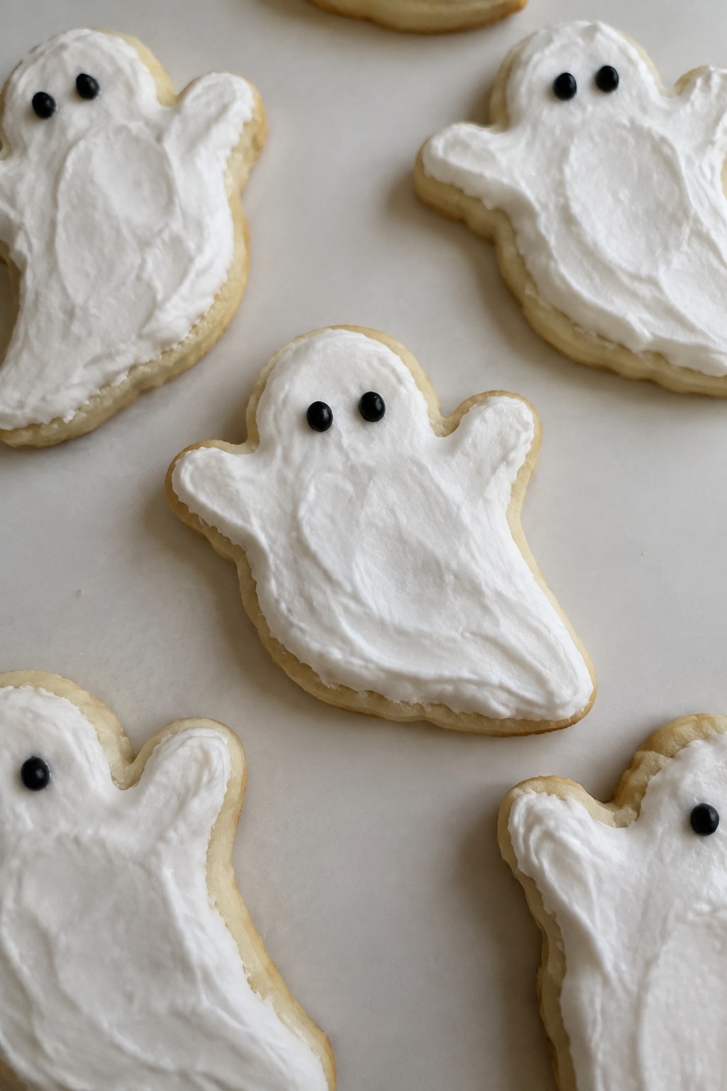 Ghost-Shaped Sugar Cookies with Marshmallow Icing