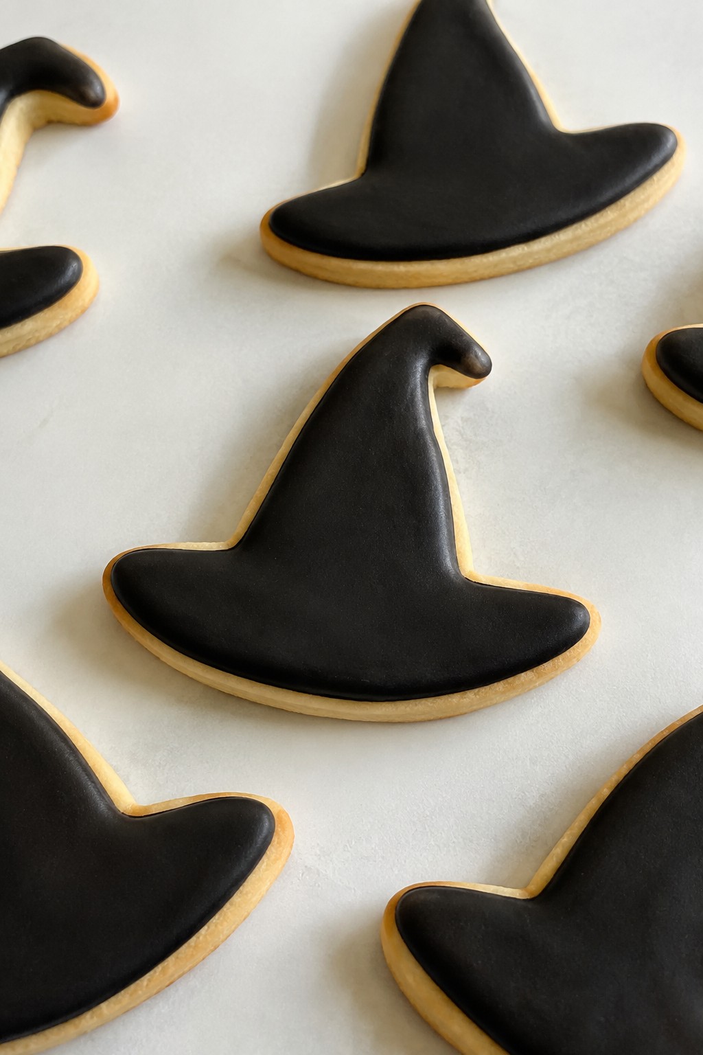 Witch Hat Sugar Cookies with Black Cocoa Glaze