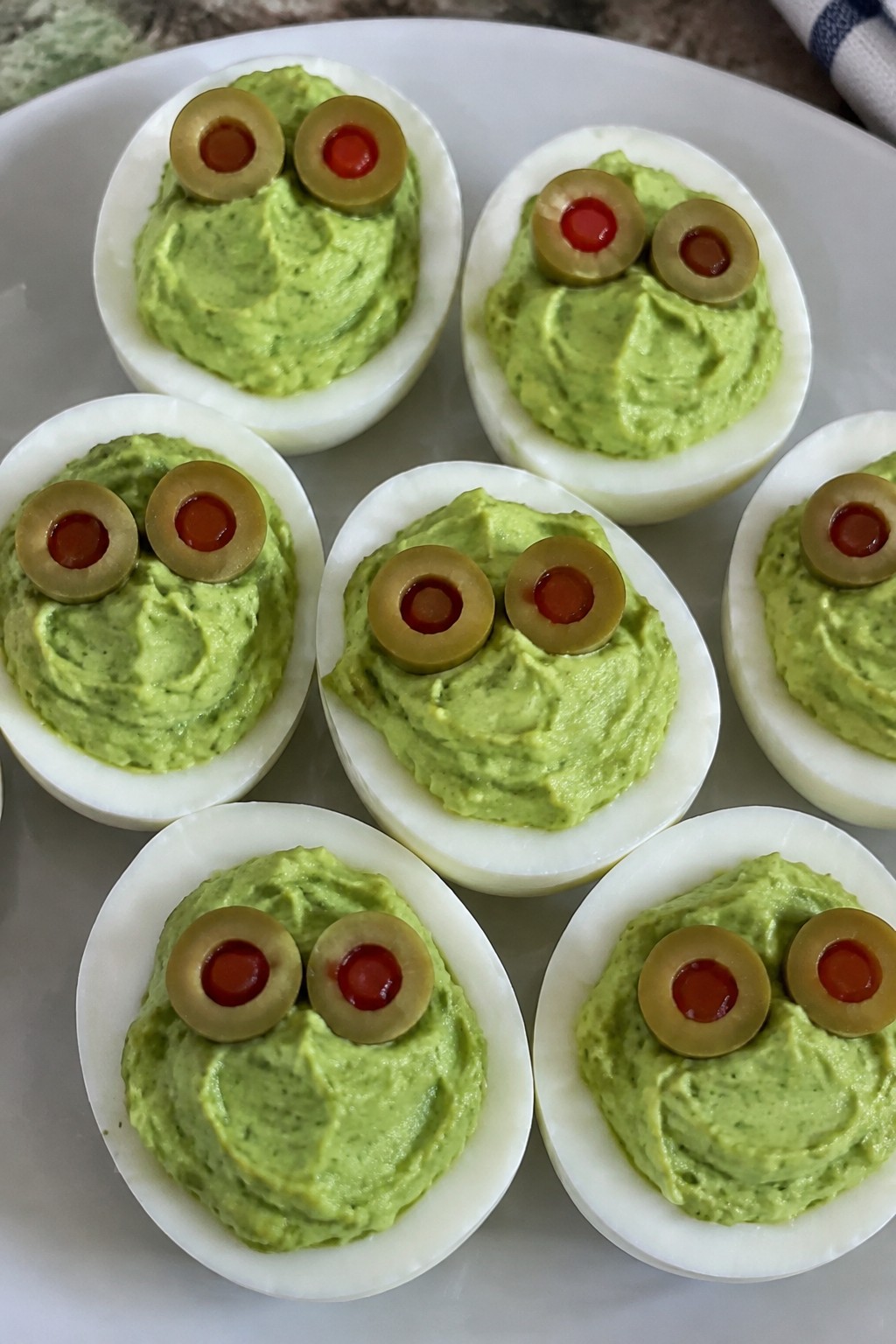 Monster Green Deviled Eggs with Olive Eyes