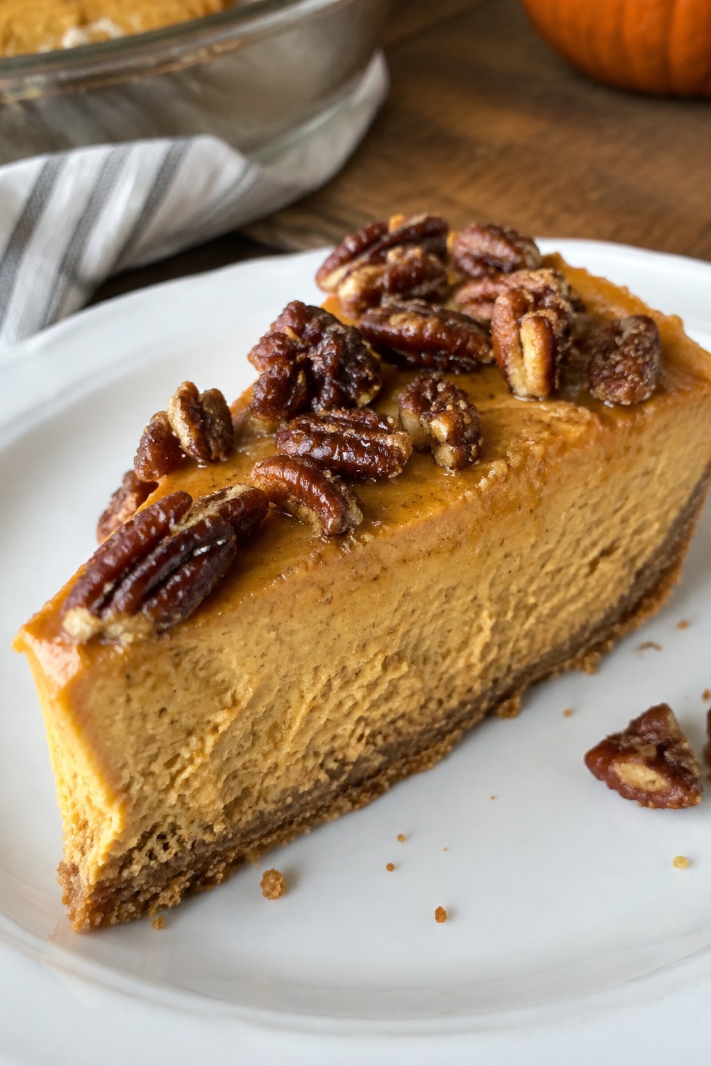 Bourbon Pumpkin Cheesecake with Candied Pecans