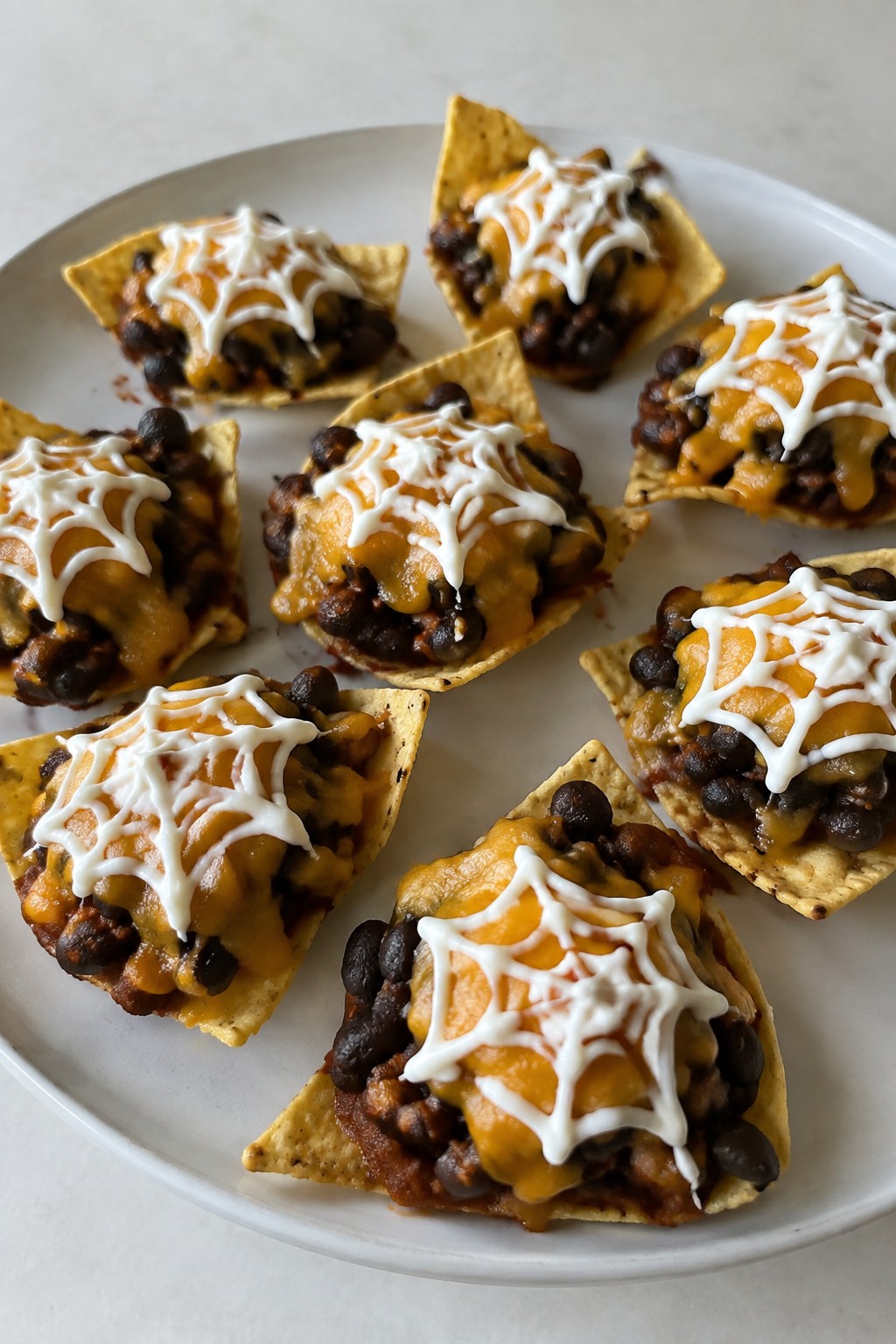 Spiderweb Black Bean Nacho Bites