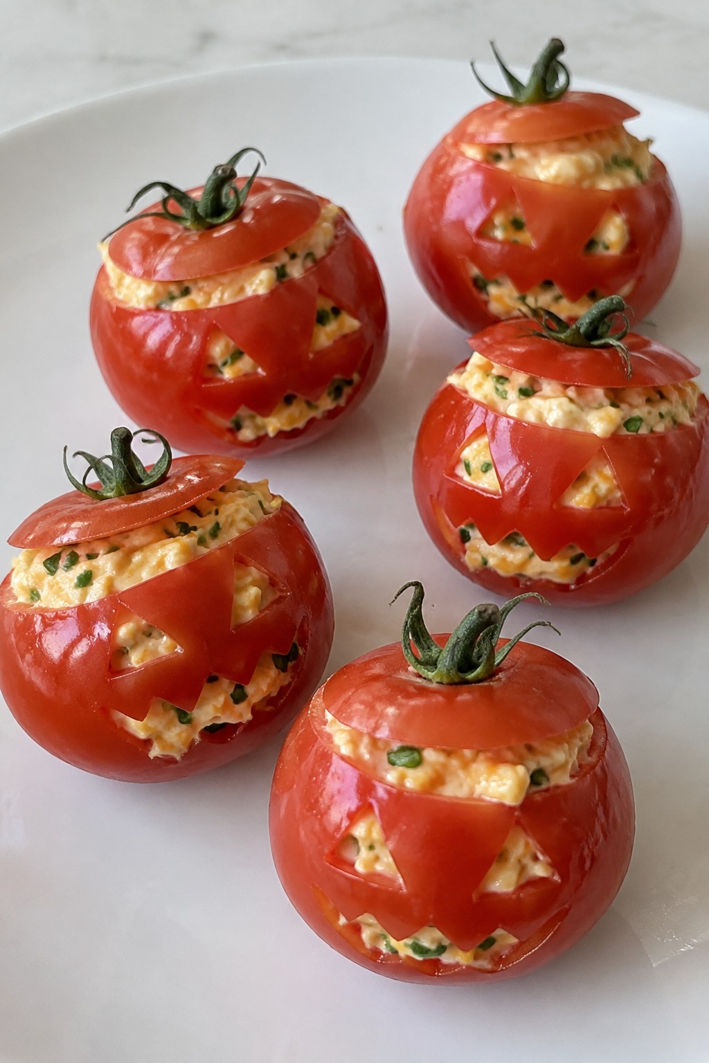 Jack-o'-Lantern Stuffed Cherry Tomatoes