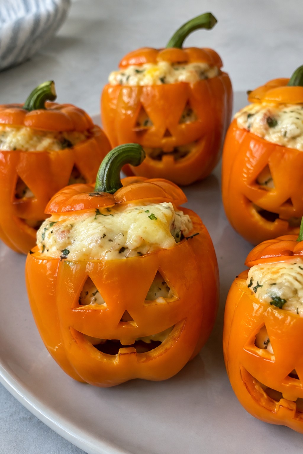 Jack-O'-Lantern Stuffed Mini Peppers