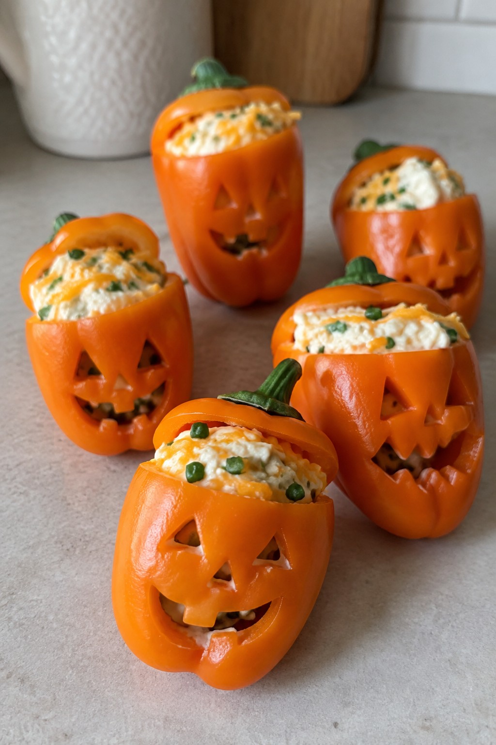 Jack-O'-Lantern Stuffed Mini Peppers
