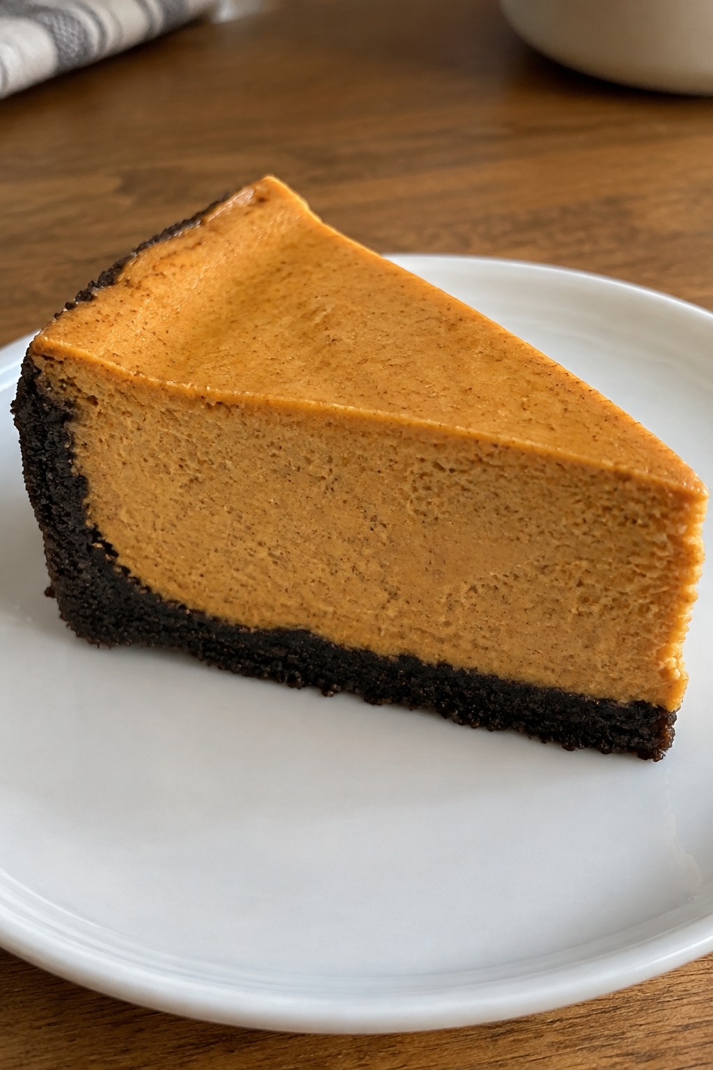 Pumpkin Cheesecake with Black Cocoa Crust