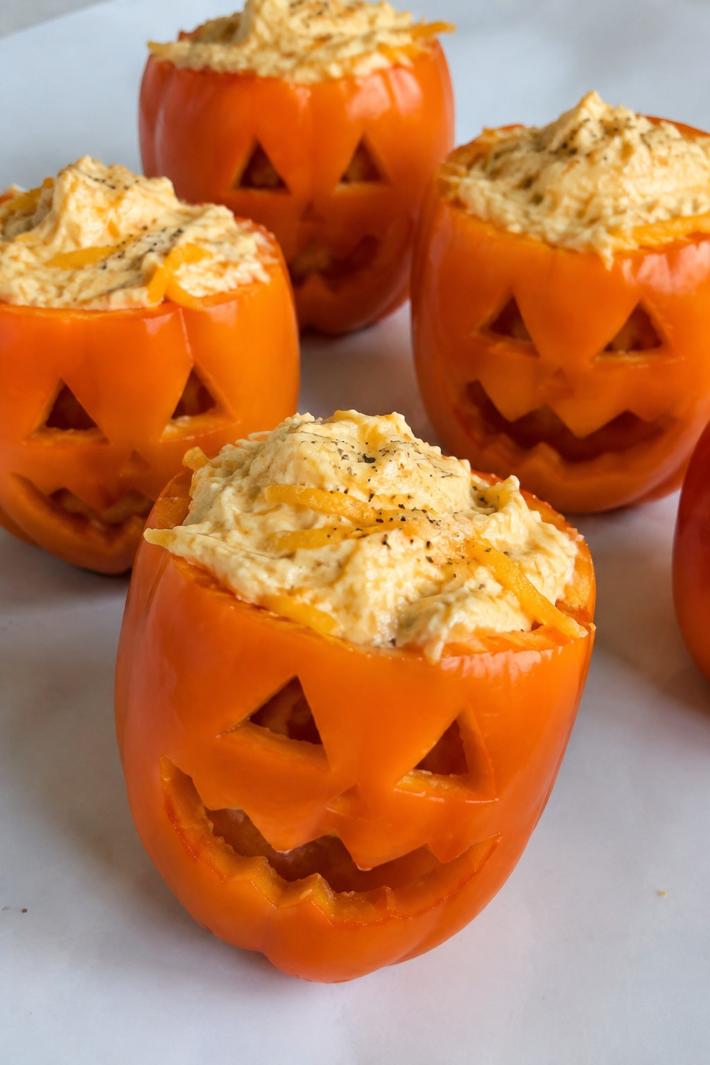 Jack-o'-Lantern Stuffed Mini Peppers