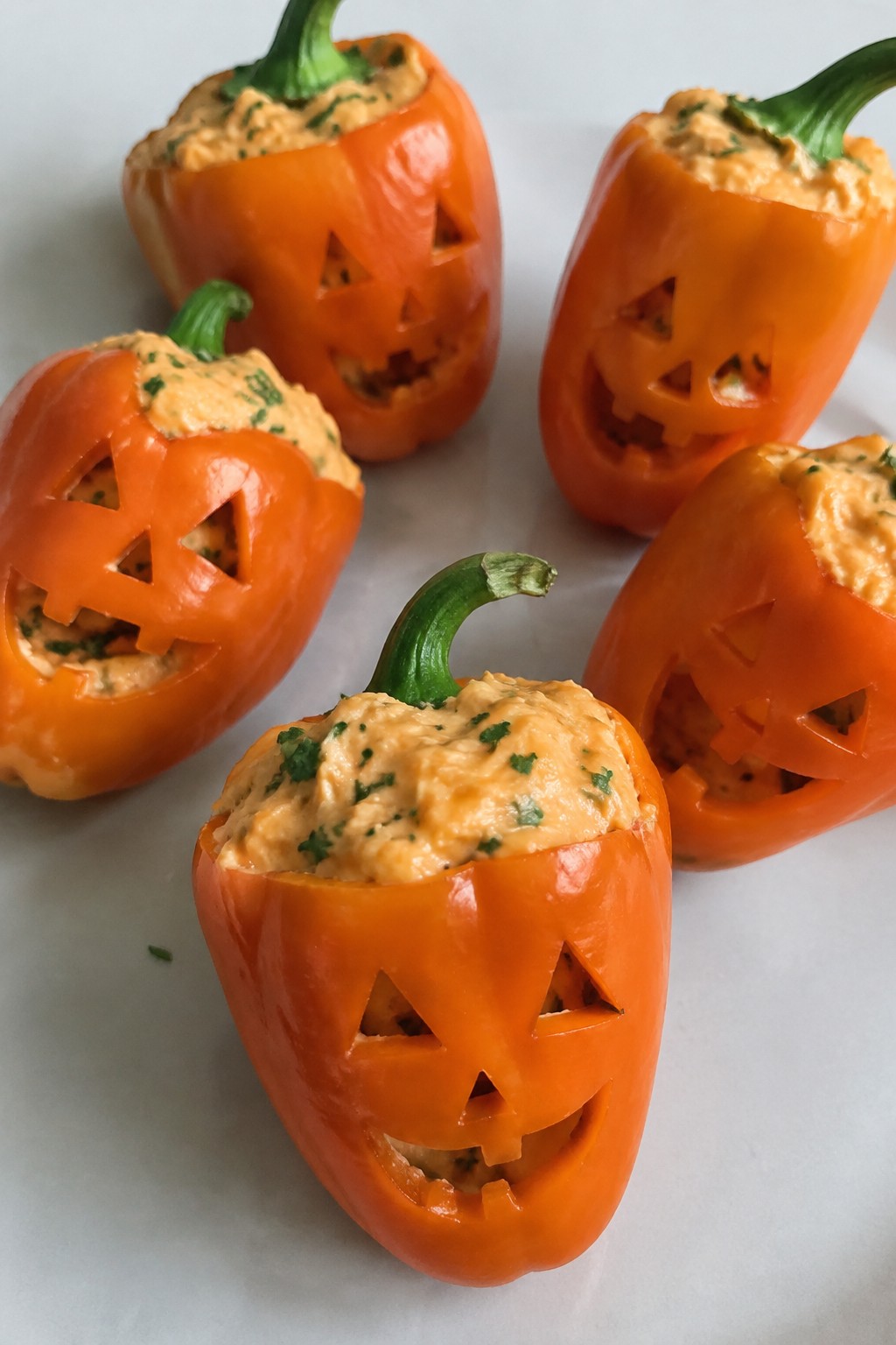 Jack-o'-Lantern Stuffed Mini Peppers