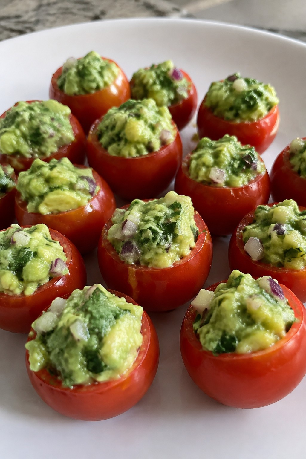 Monster Green Guacamole Stuffed Cherry Tomatoes