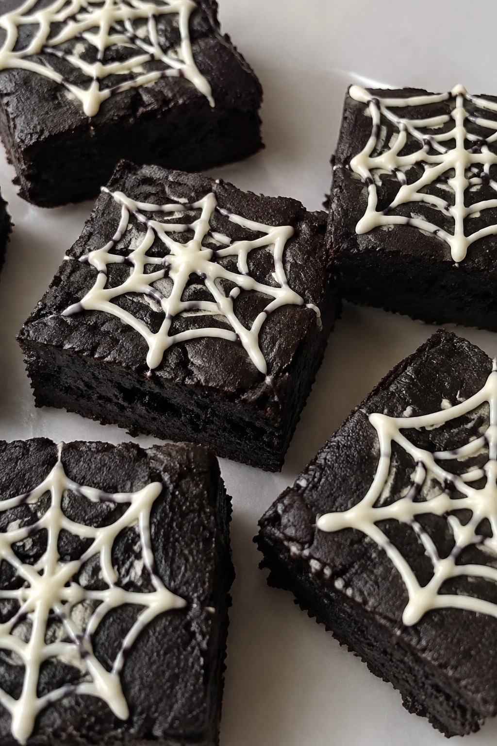 Fudgy Black Cocoa Spiderweb Brownies