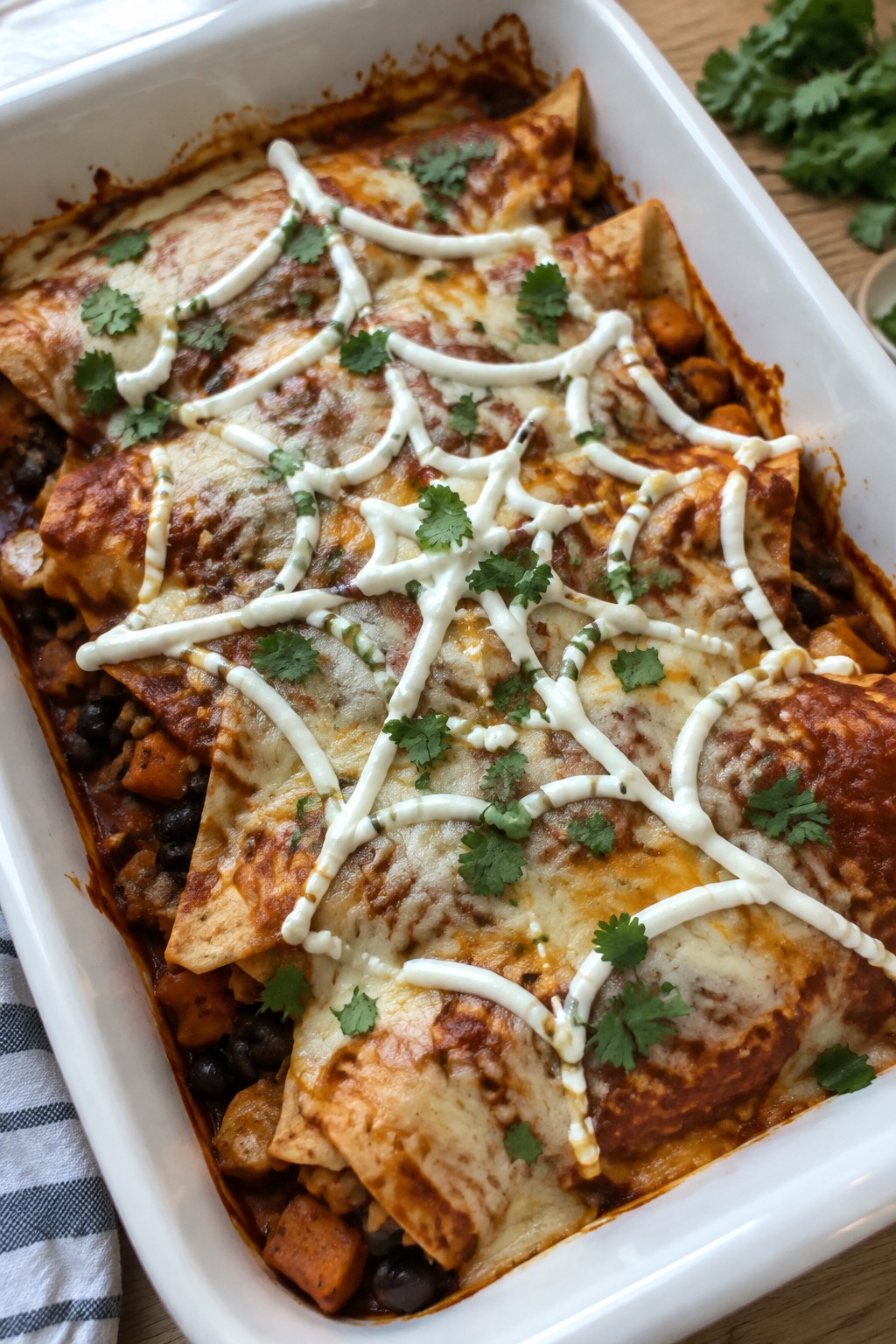 Spiderweb Black Bean and Sweet Potato Enchiladas