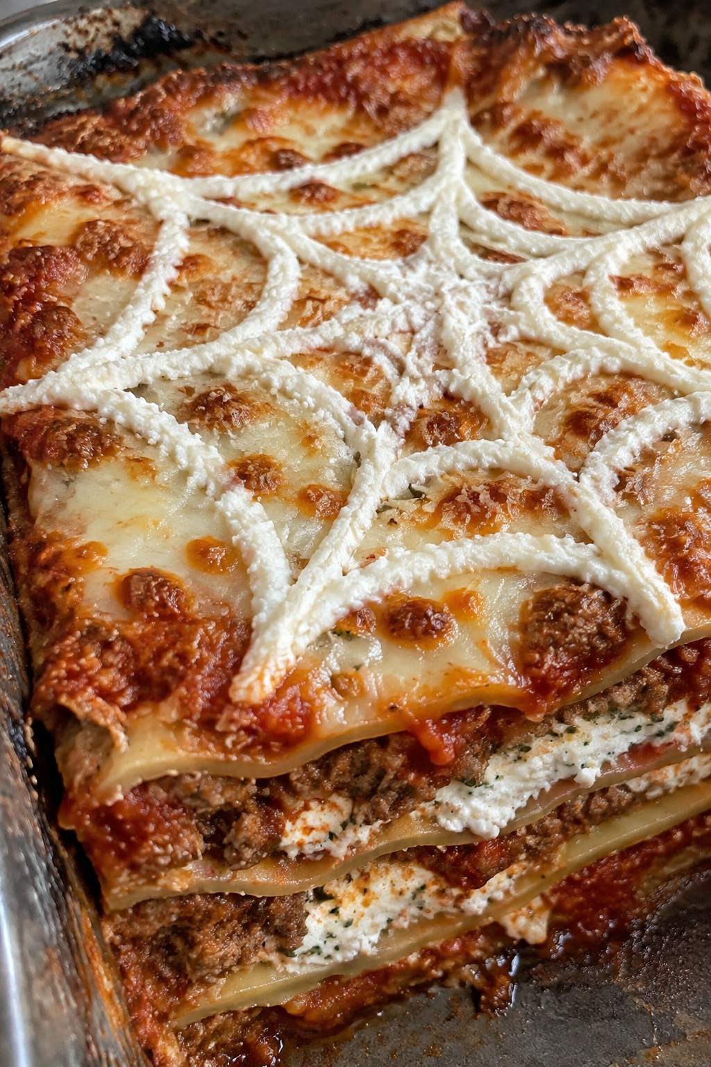 Spooky Spiderweb Lasagna with Ricotta Webs