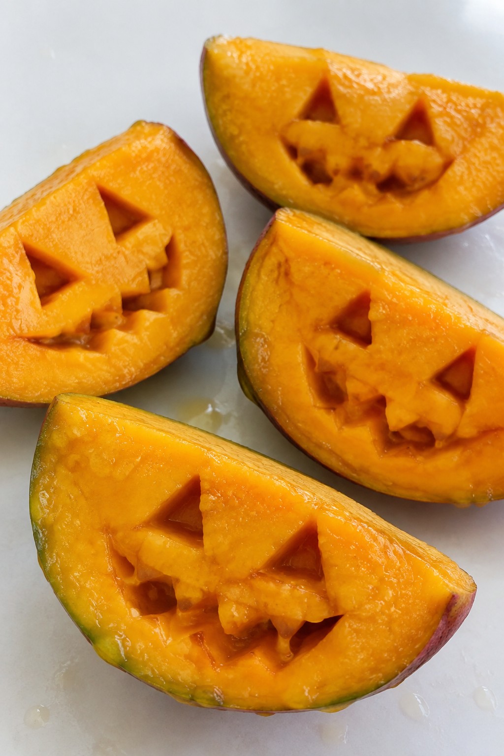 Mango Jack-o'-Lantern Wedges