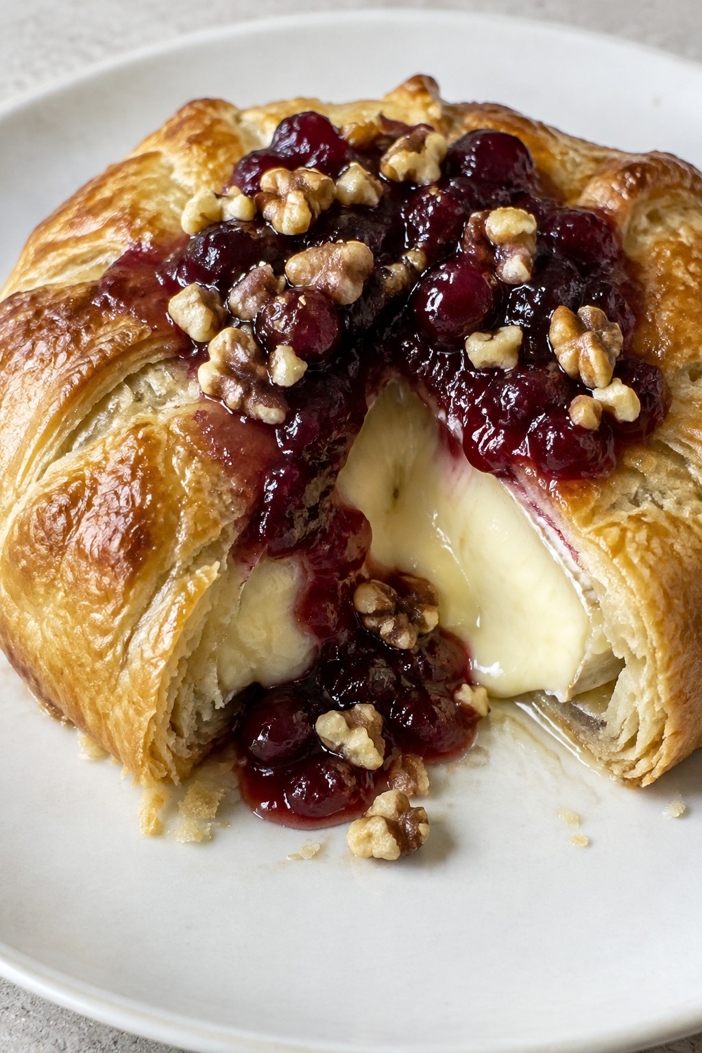 Baked Brie en Croûte with Cranberry Port Compote and Walnuts