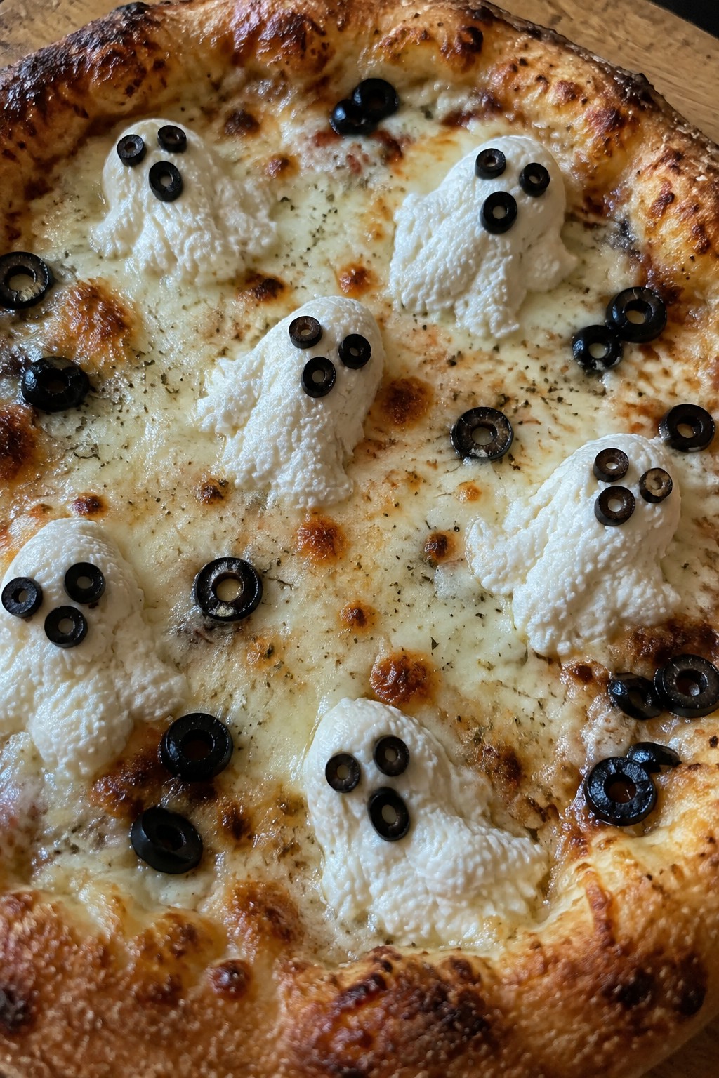 Ghostly Ricotta and Black Olive Pizza