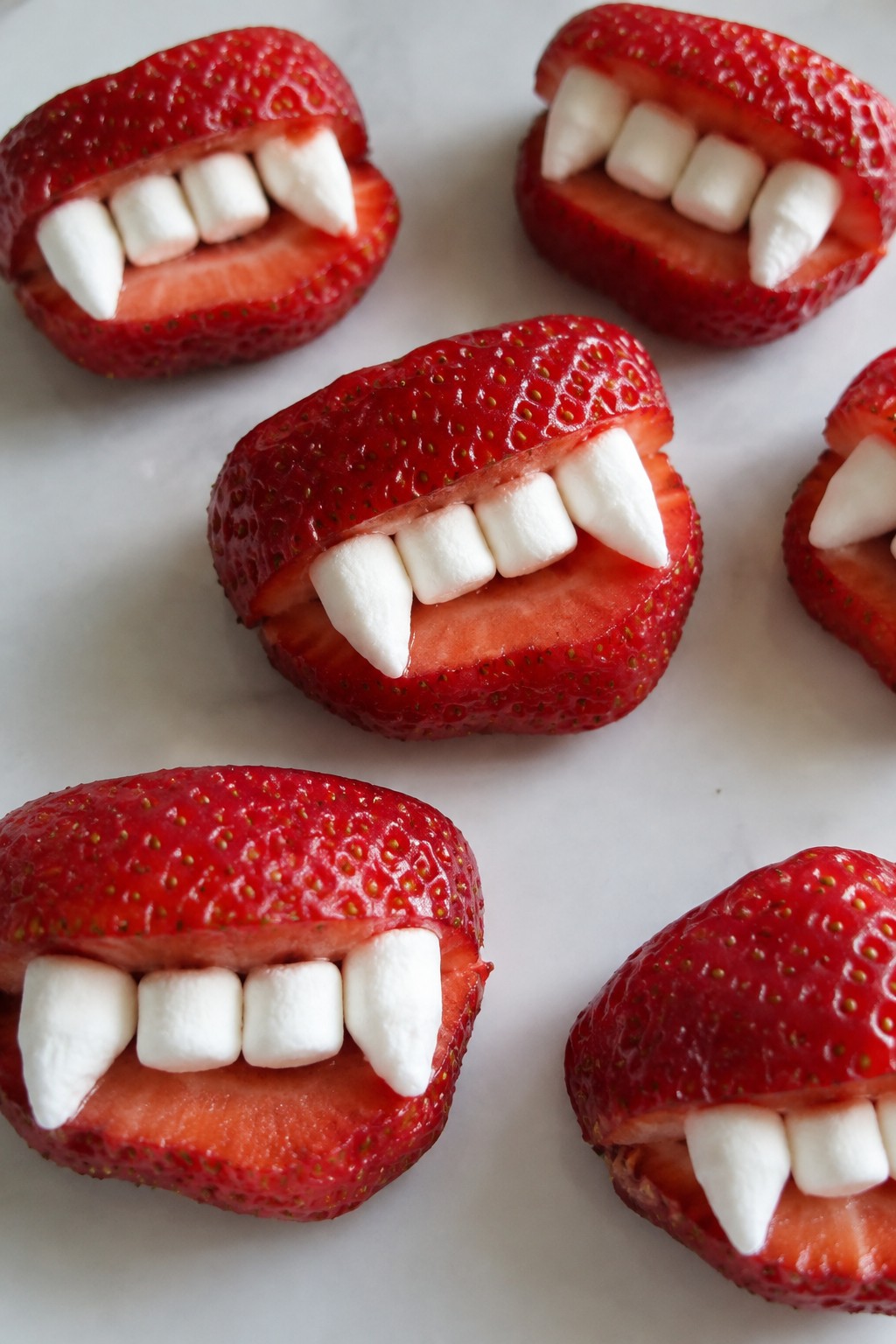 Vampire Strawberry Bites with Marshmallow Teeth