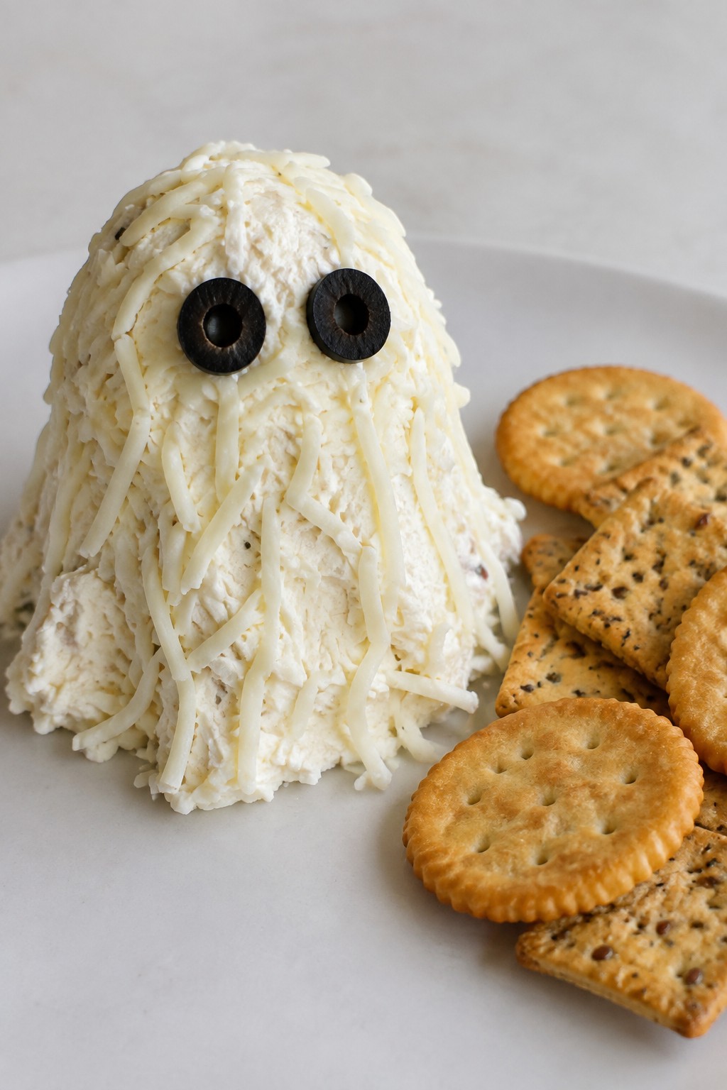 Ghostly Cheese Ball with Crackers