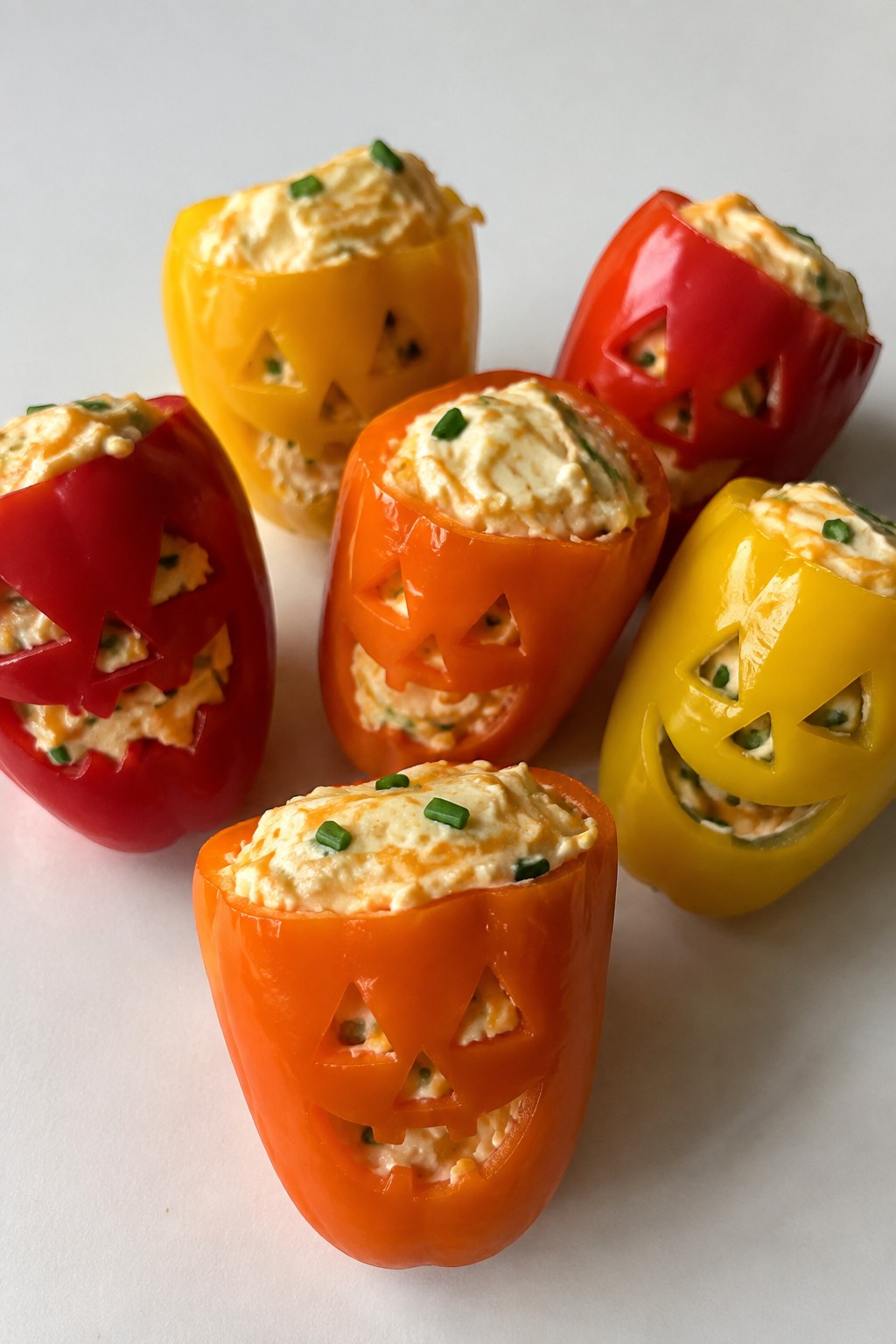 Jack-o'-Lantern Stuffed Mini Peppers