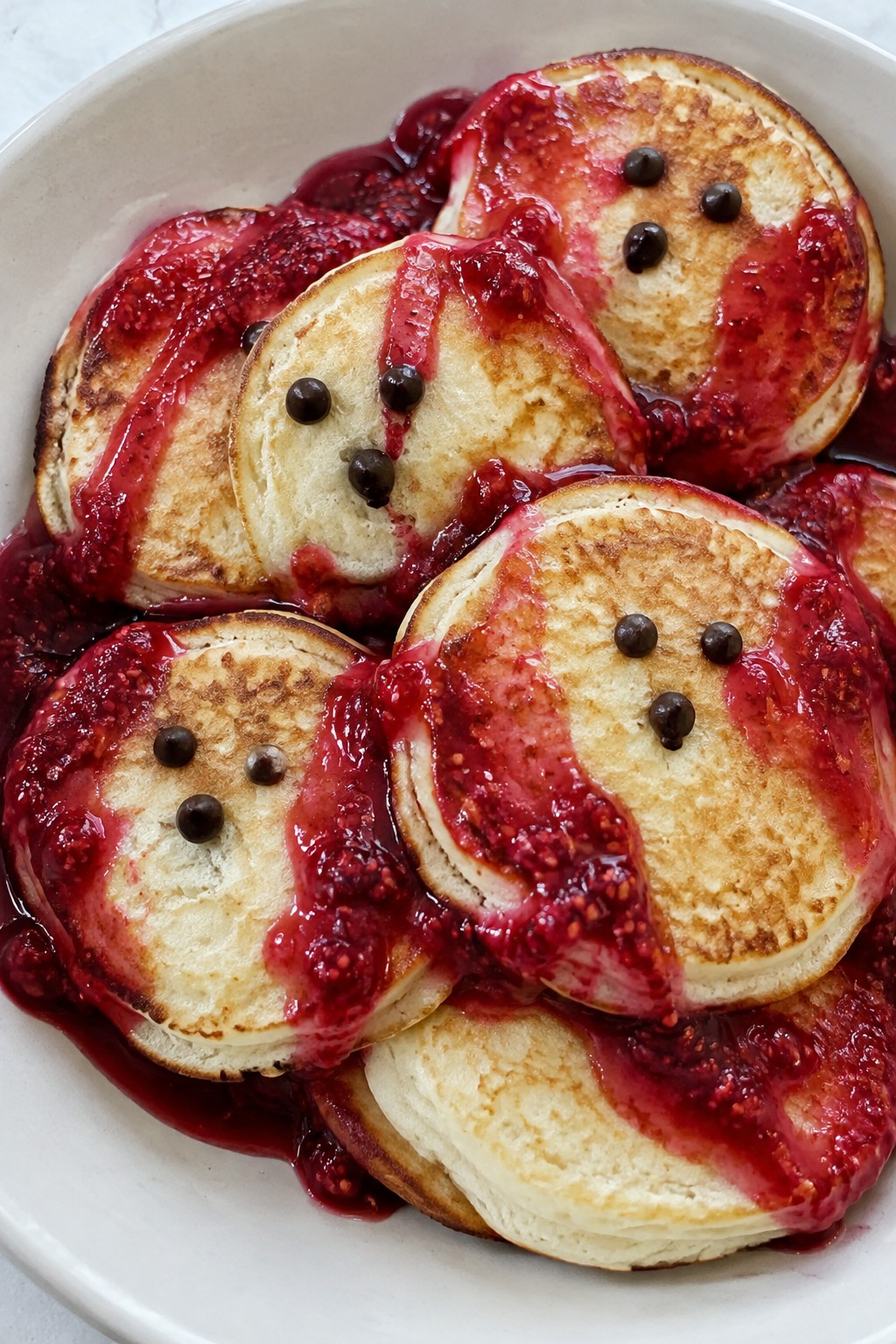 Ghost Pancakes with Raspberry Syrup