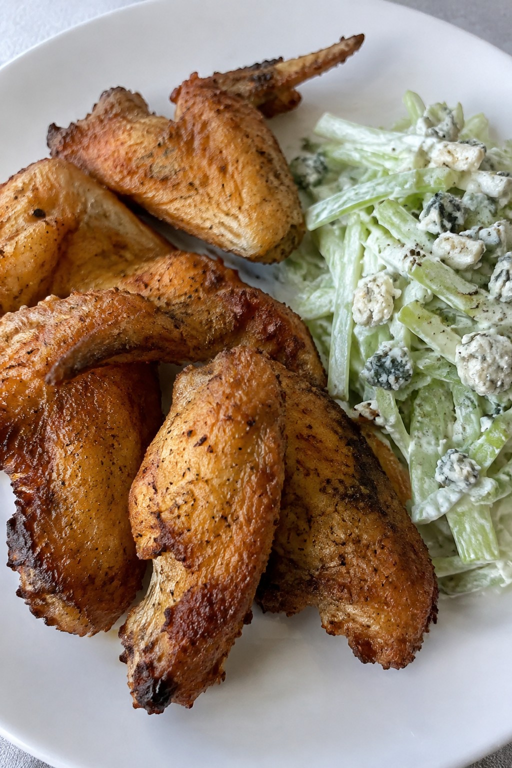 Bat-Wing Crispy Chicken Wings with Celery Slaw and Blue Cheese
