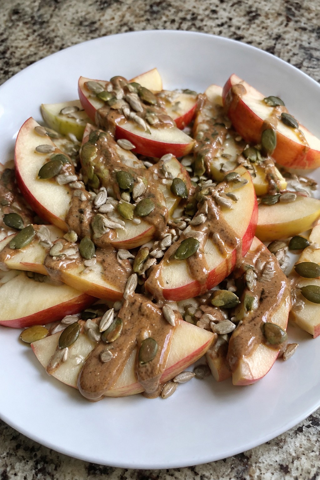 Spooky Apple Nachos with Almond Butter and Seeds