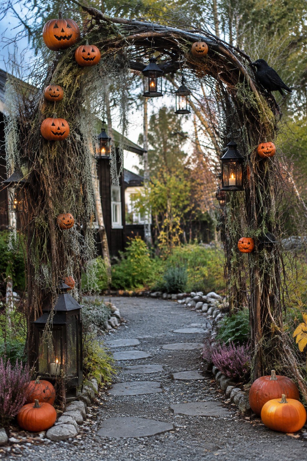 Garden arch covered in vines and moss, decorated with multiple carved jack o lanterns and hanging lanterns along an outdoor stone path.