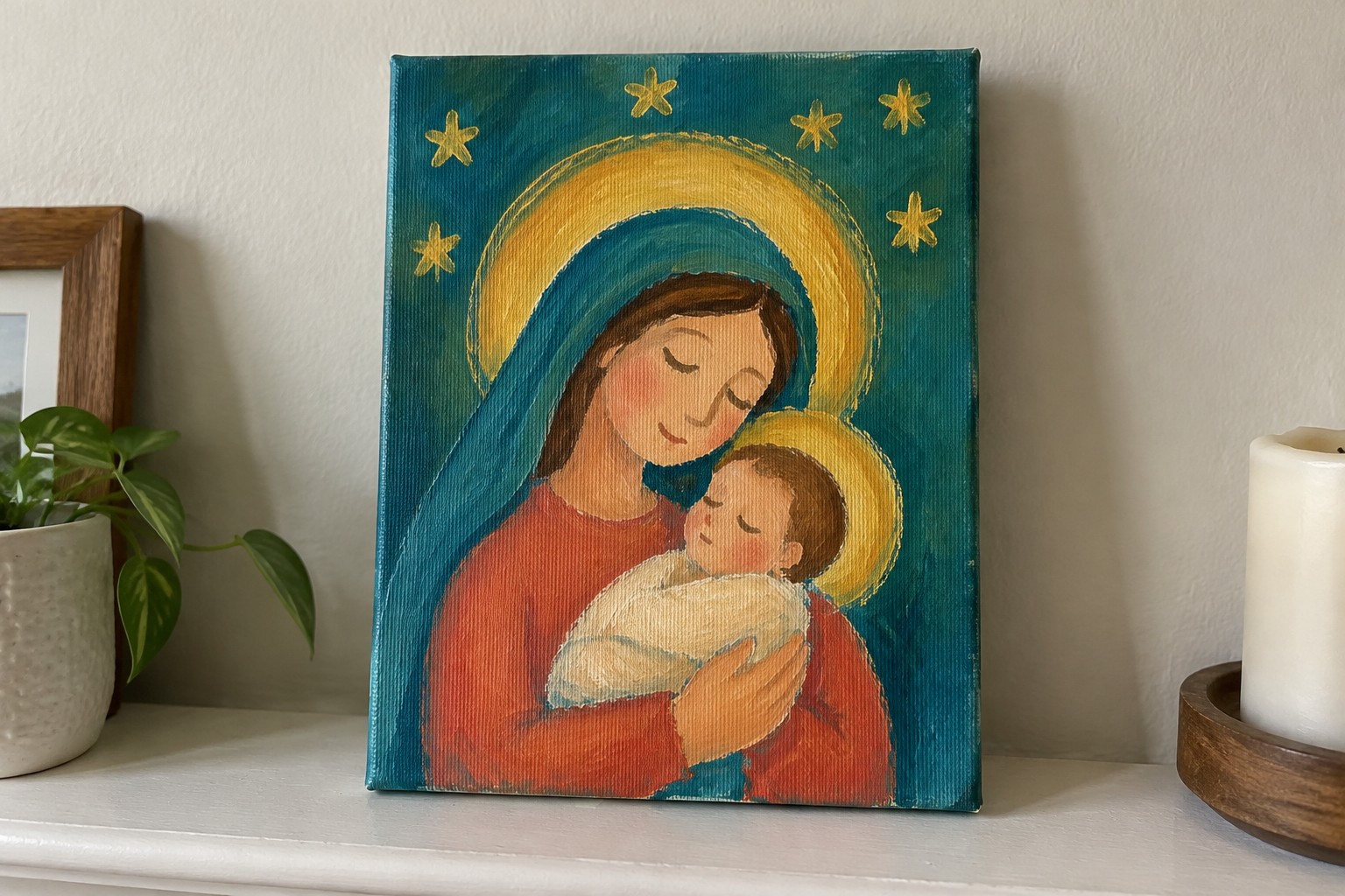 Teal and gold painting of haloed mother in blue veil cradling infant with stars