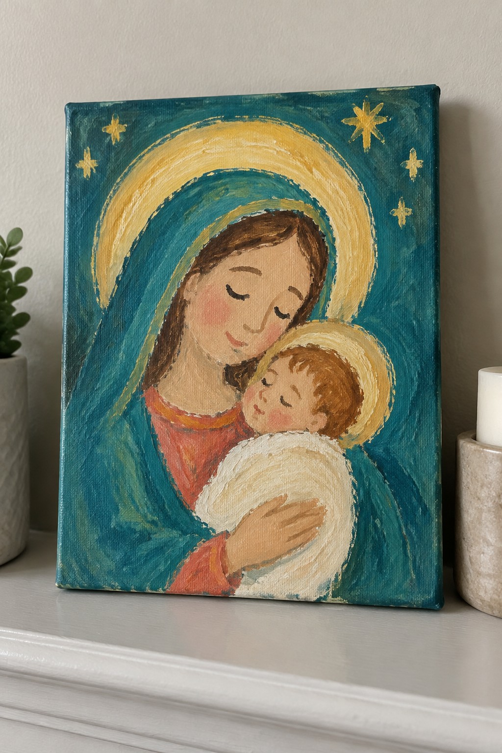 Teal and gold painting of haloed mother in blue veil cradling infant with stars