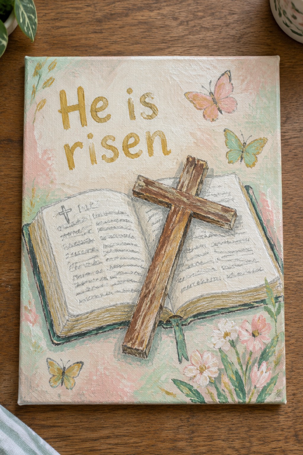 Pastel painting of open book with wooden cross under 
