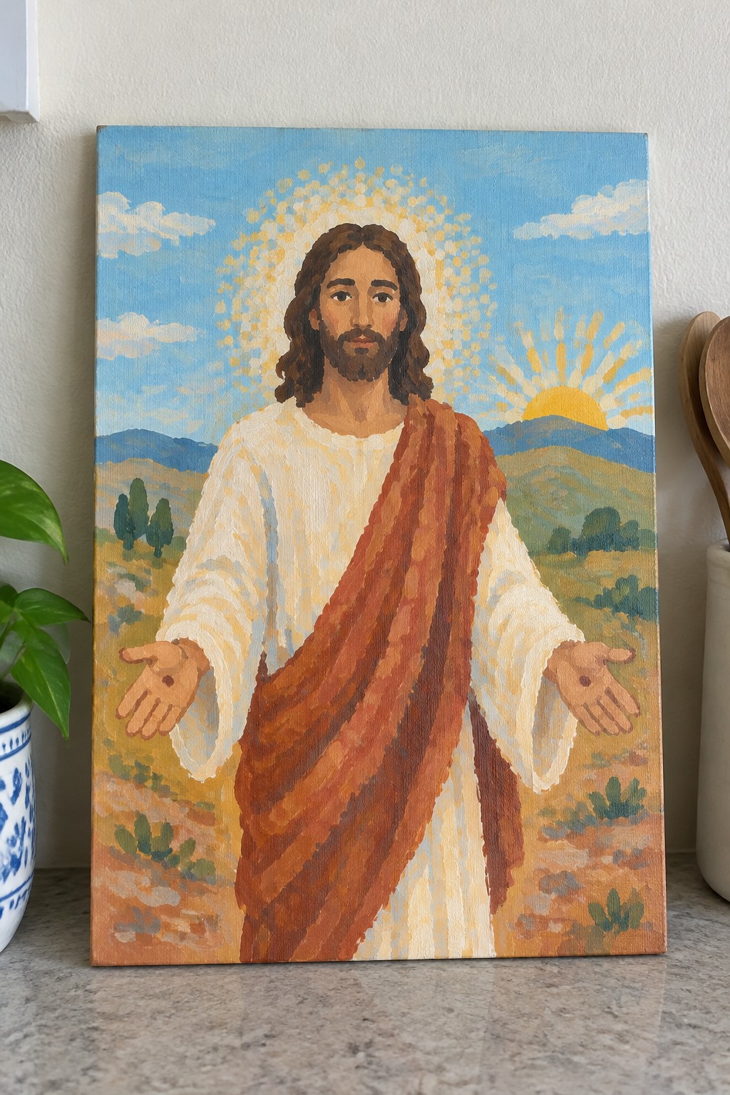 Jesus with beard in white robe and red cloak, arms outstretched, golden halo over sunny hills.