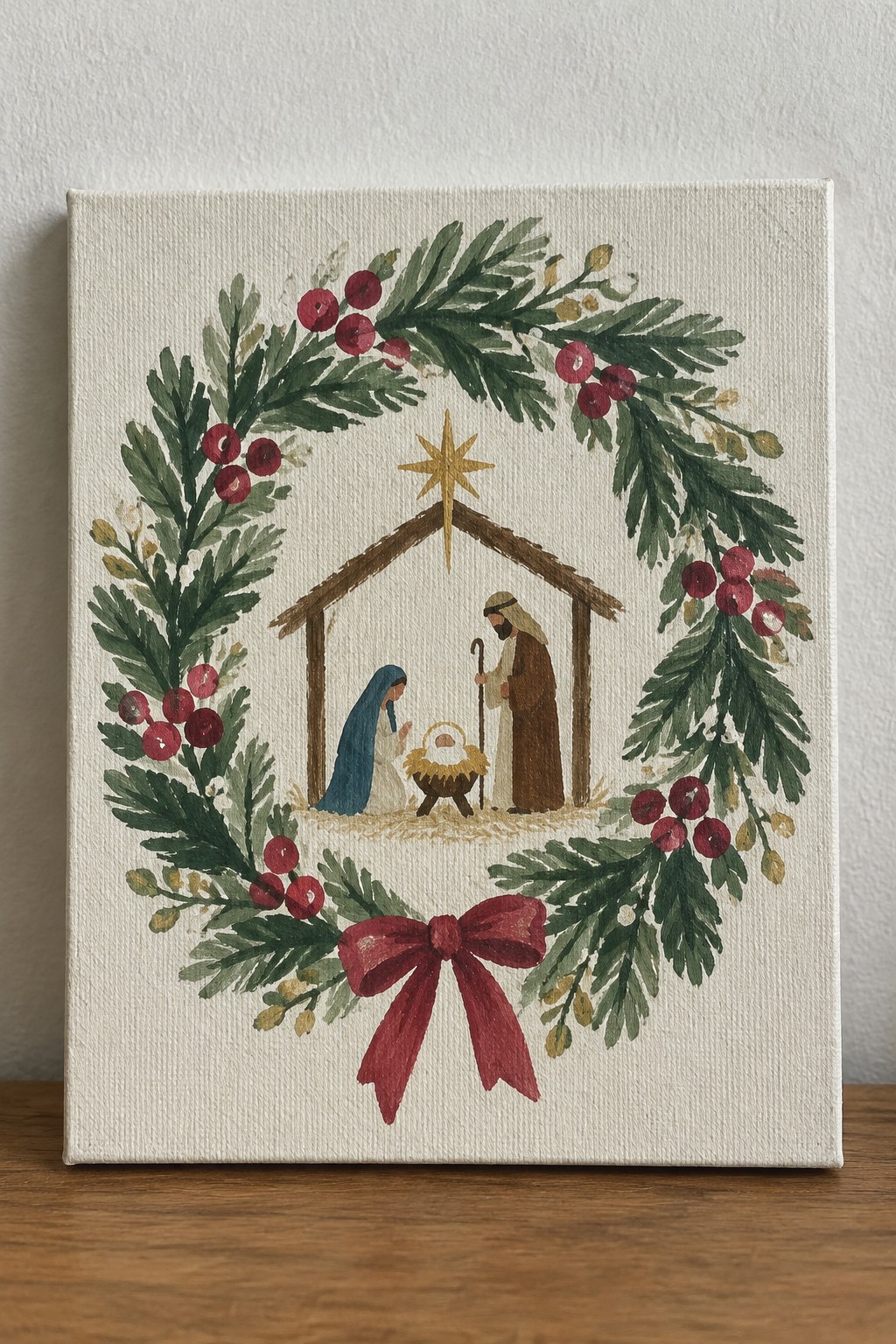 Nativity scene with Mary, Joseph, and manger inside green wreath with red bow and berries.