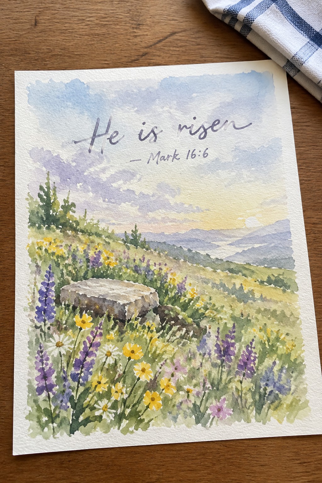 Watercolor meadow with wildflowers, stone, mountains, and