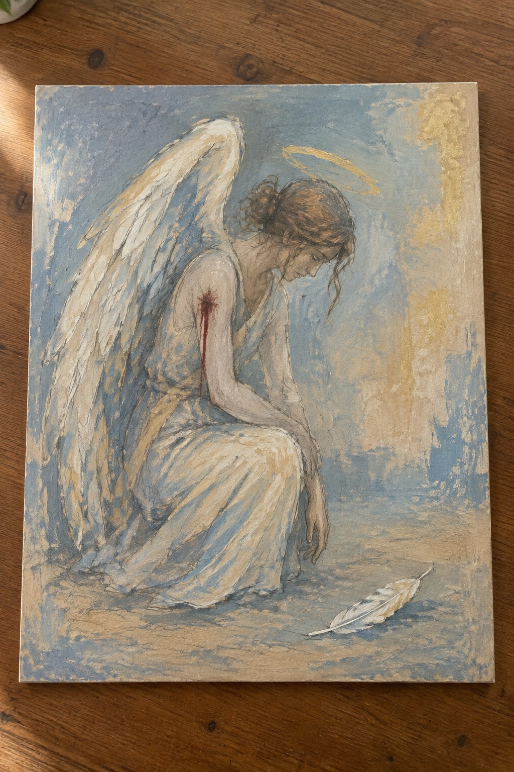 Wounded angel with white wings and halo in blue dress, feather on ground, painting