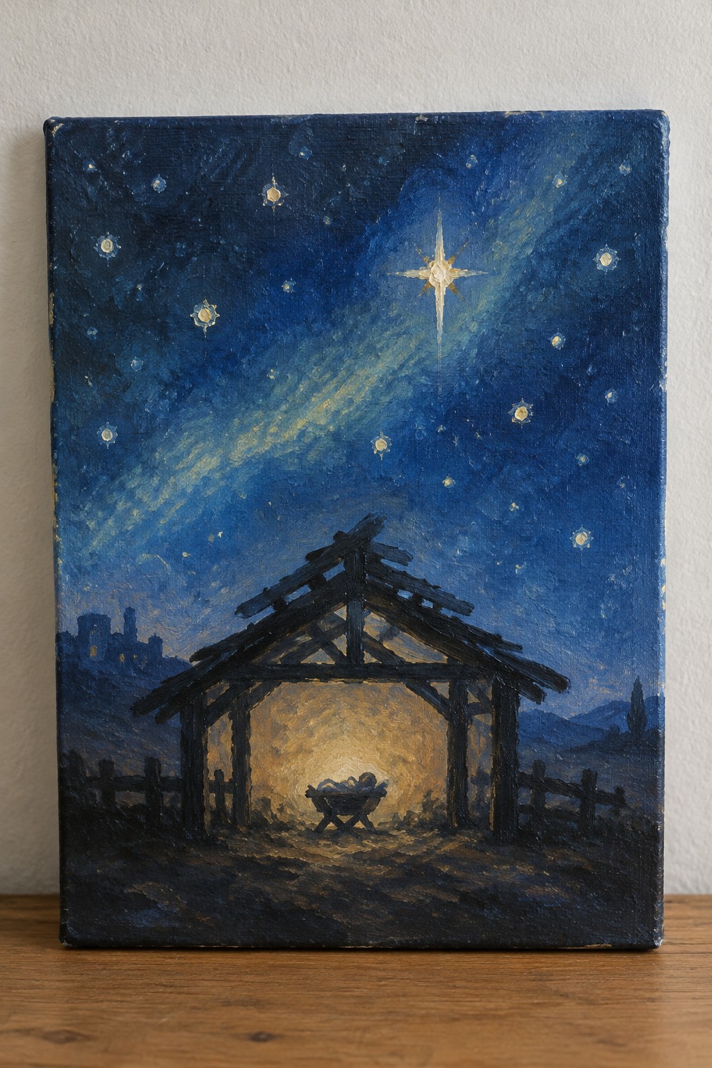 Nativity painting of baby in manger inside wooden stable under bright star in night sky