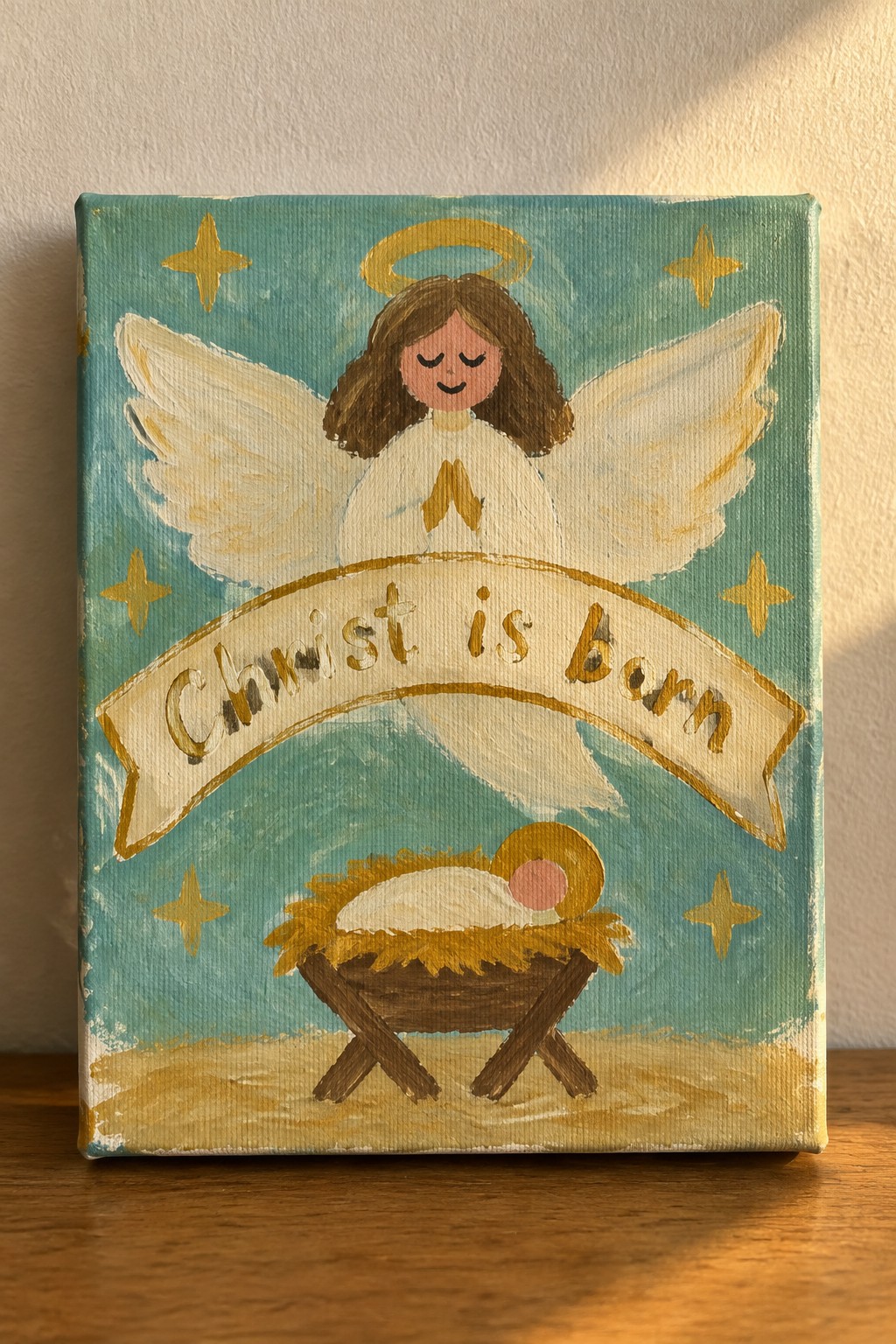 Hand-painted angel with halo above 