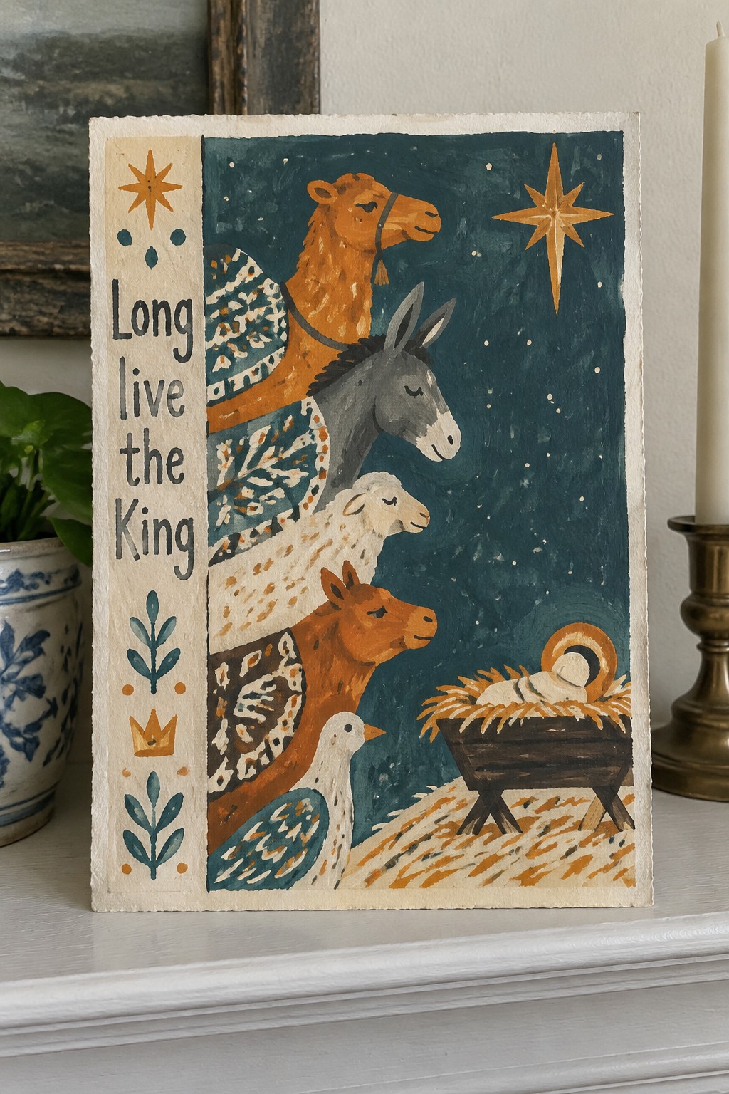 Nativity painting of animals around manger with star and 