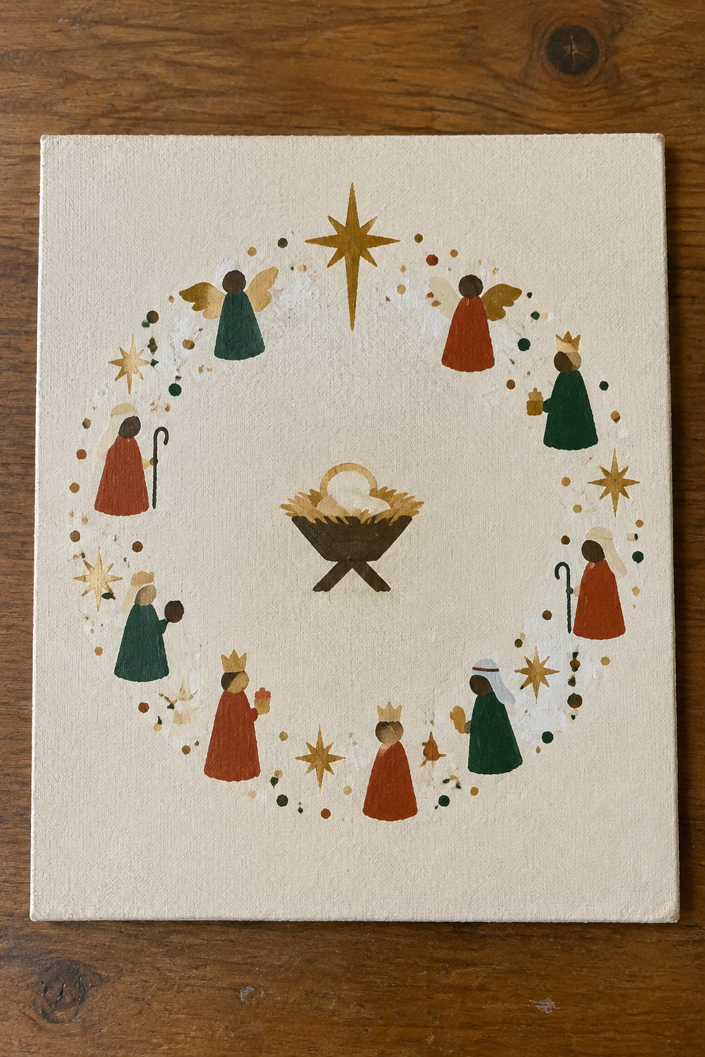 Circular nativity painting with central manger, winged angels, robed kings, and golden stars.