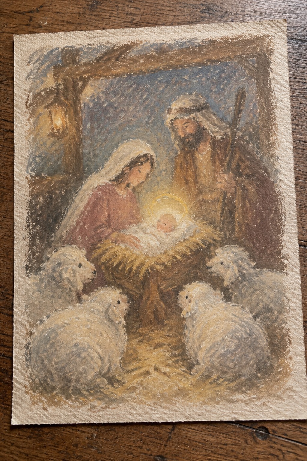 Nativity watercolor with Mary in pink robe, Joseph with staff, haloed baby, and sheep in stable