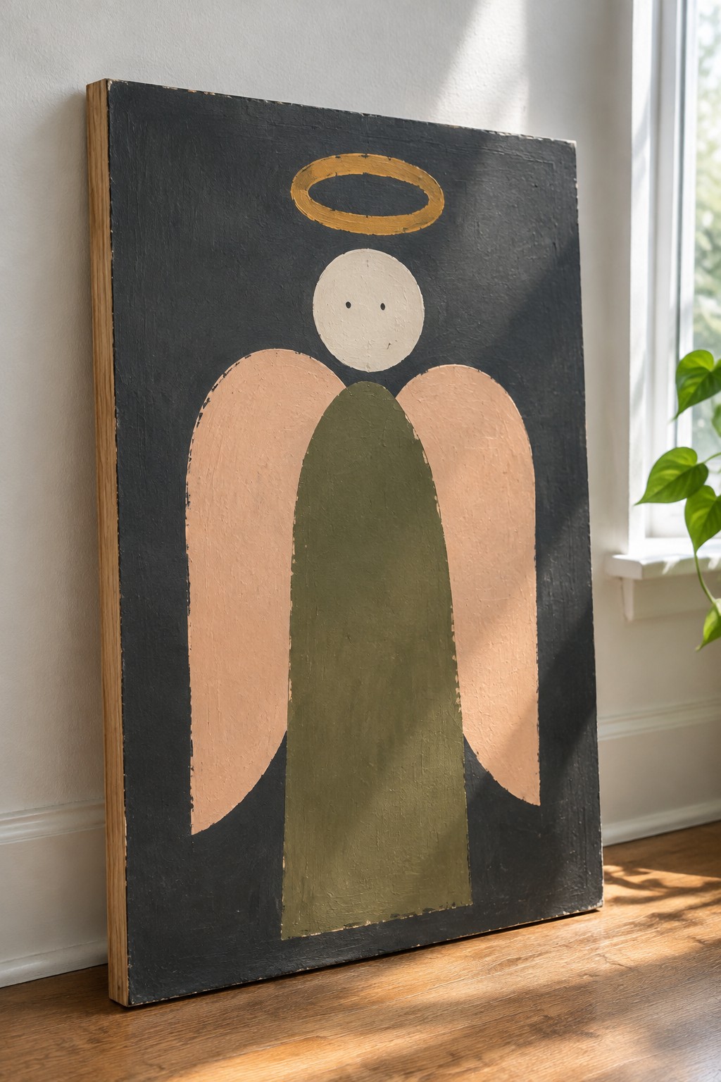 Abstract angel with peach wings, olive body, white head and gold halo on black canvas
