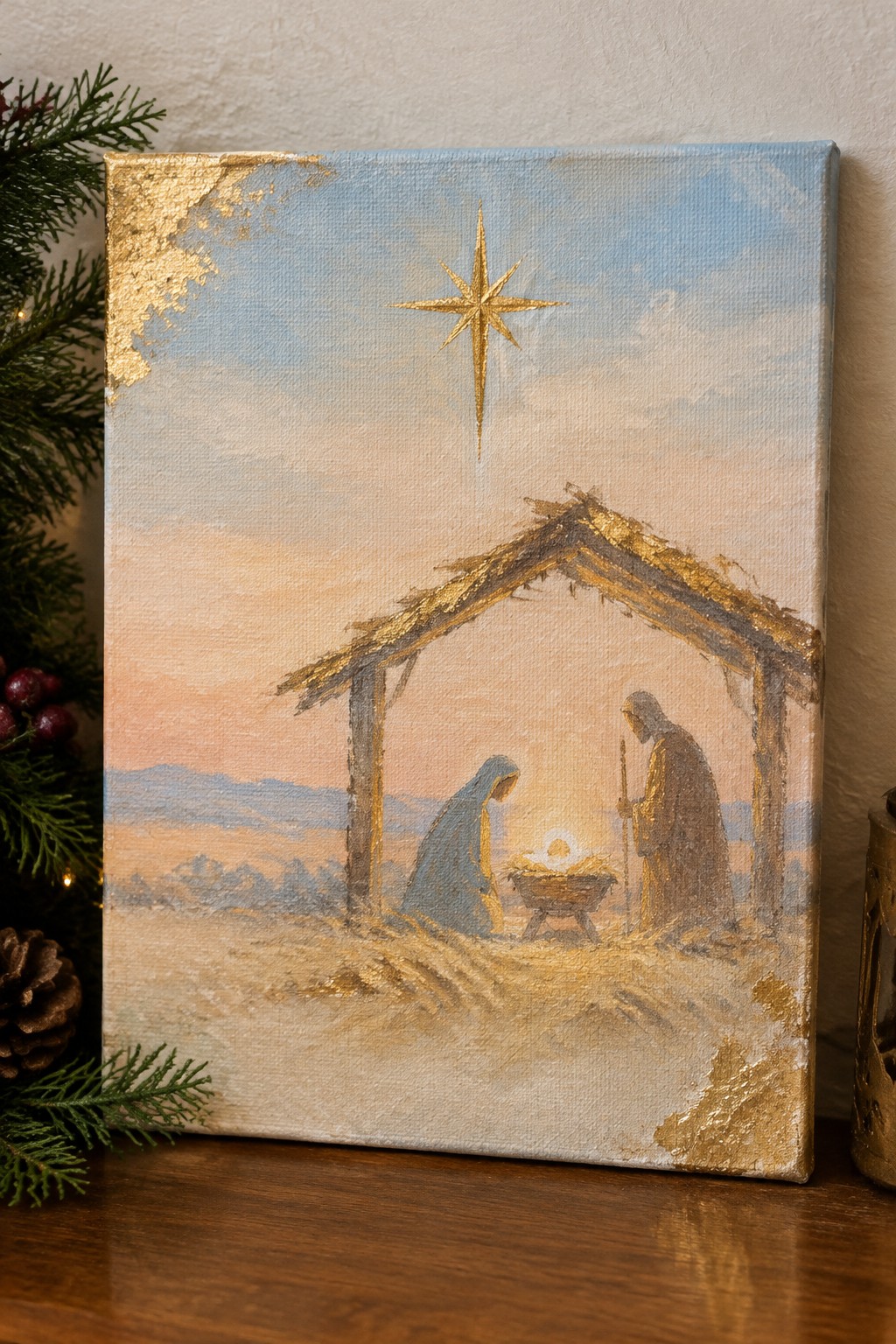 Impressionistic nativity painting with Mary in blue, Joseph in brown, golden star over manger.
