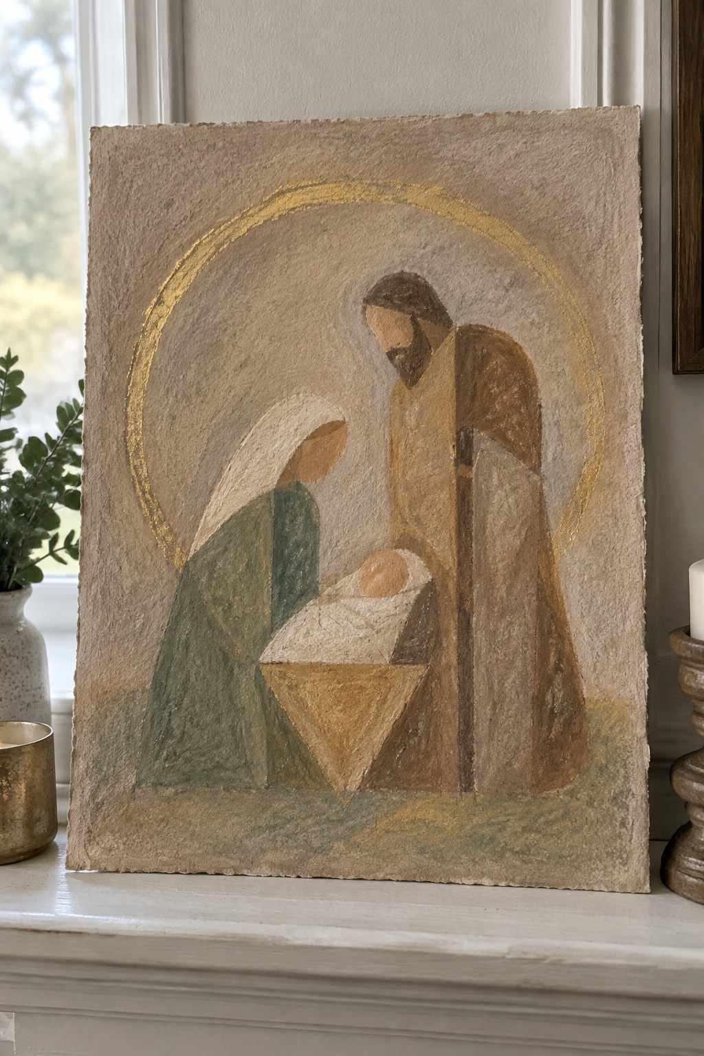 Abstract painting of Mary in green, Joseph in brown robes, baby in manger, golden halo