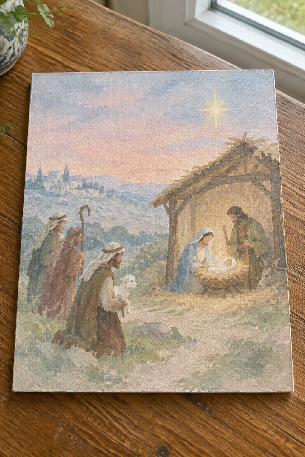 Watercolor nativity scene with shepherds, lamb, Mary, Joseph, manger, donkey under glowing star